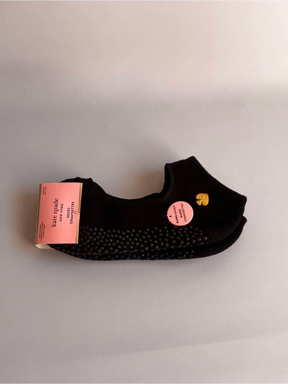 kate spade black no-show yoga socks with gold heart accent